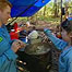 Adventurers eating porridge
