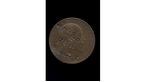 Suffragette-defaced penny
