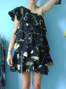 Navina's gold dress